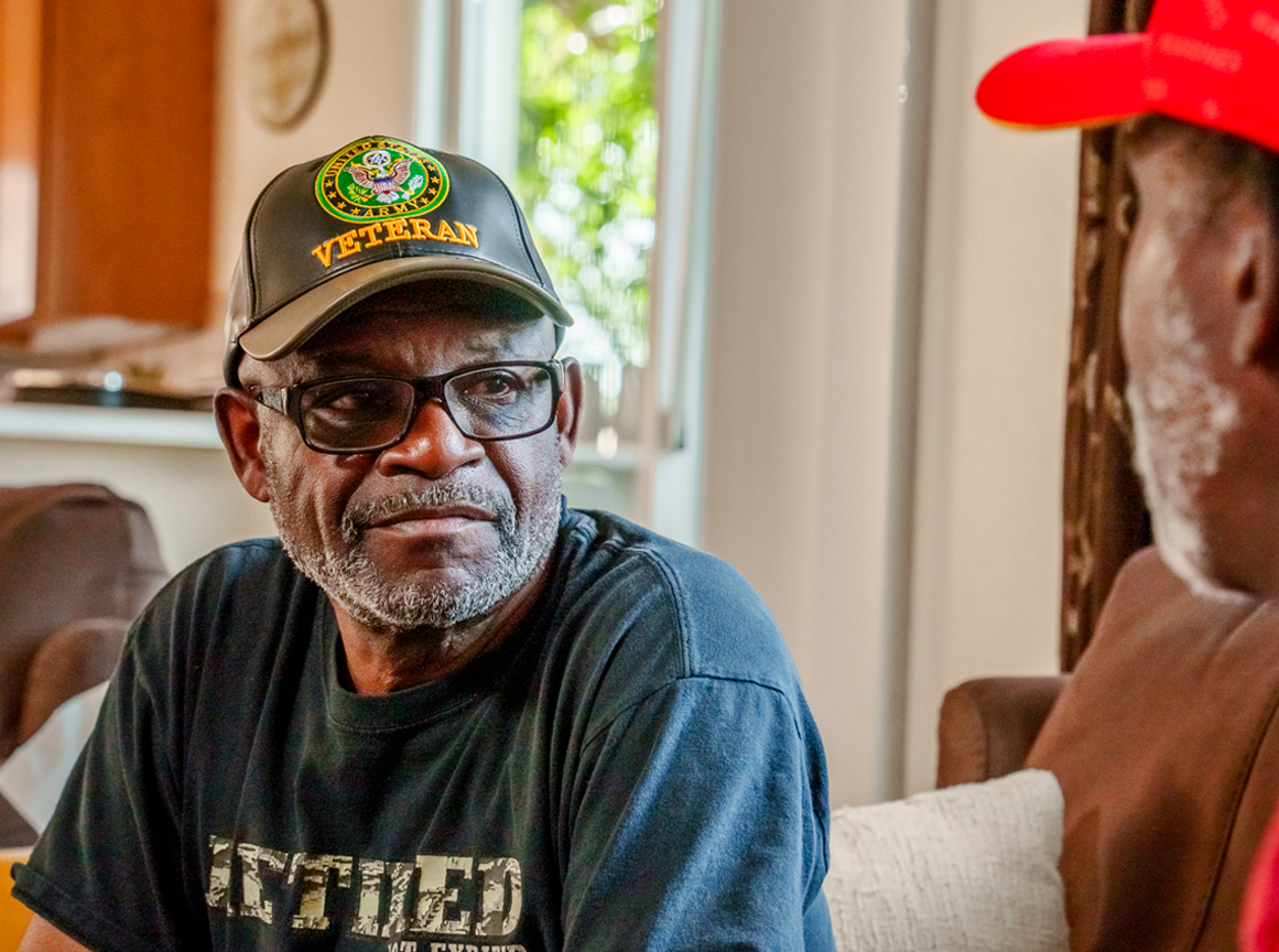 Photo of Veterans talking